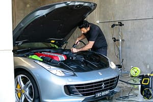 Vehicle being inspected for recurring mechanical issues under warranty